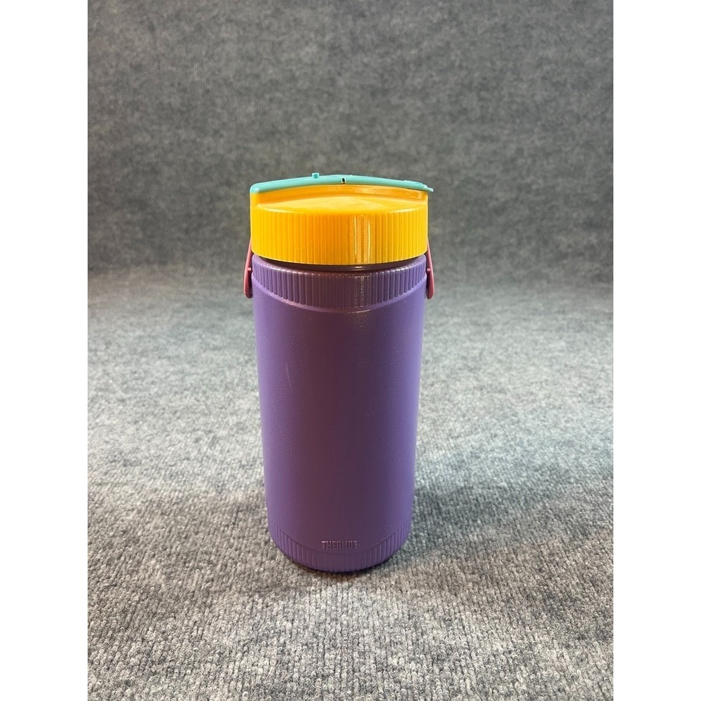 Vintage Thermos brand insulated plastic drink bottle with embossed "THERMOS"